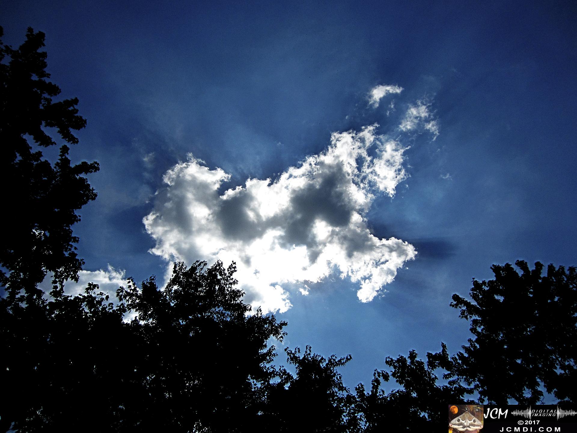 Total Eclipse - strange clouds and lighting during partial phase